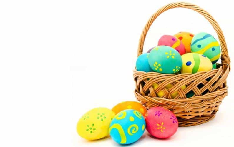 easter basket filled with colored eggs