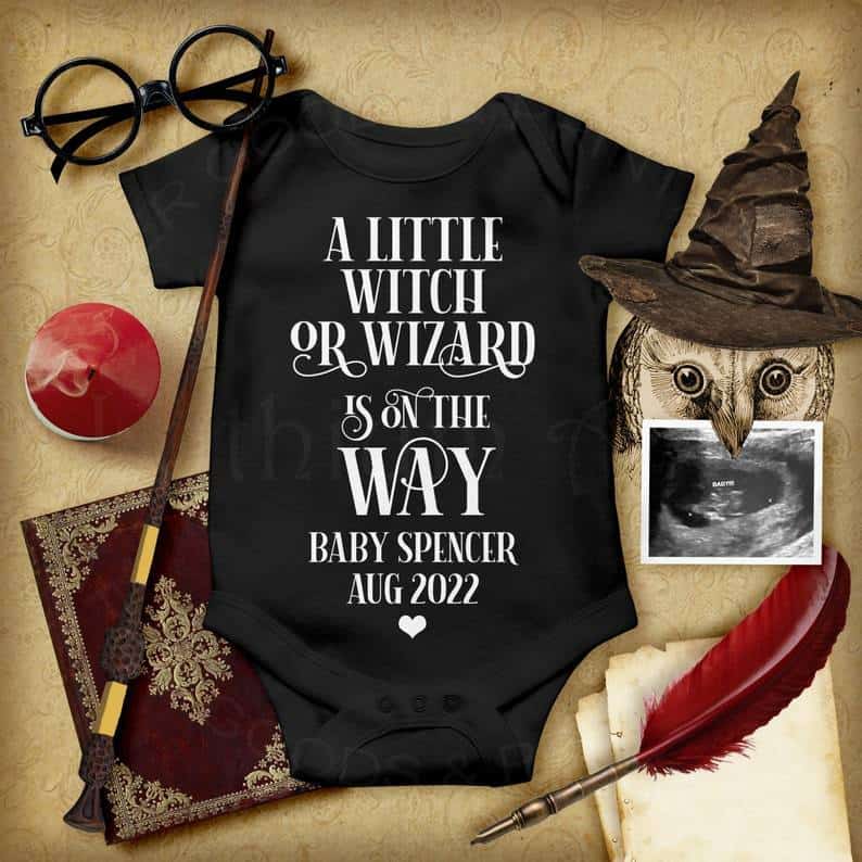 wizard themed picture with black baby outfit